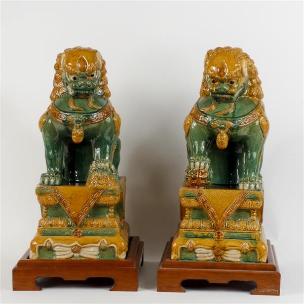 Appraisal: Pair of LARGE Chinese sancai glazed earthenware foo dogs H