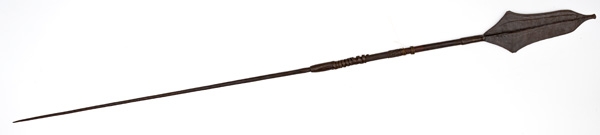 Appraisal: overall length iron blade with chiseled line decoration Wooden haft