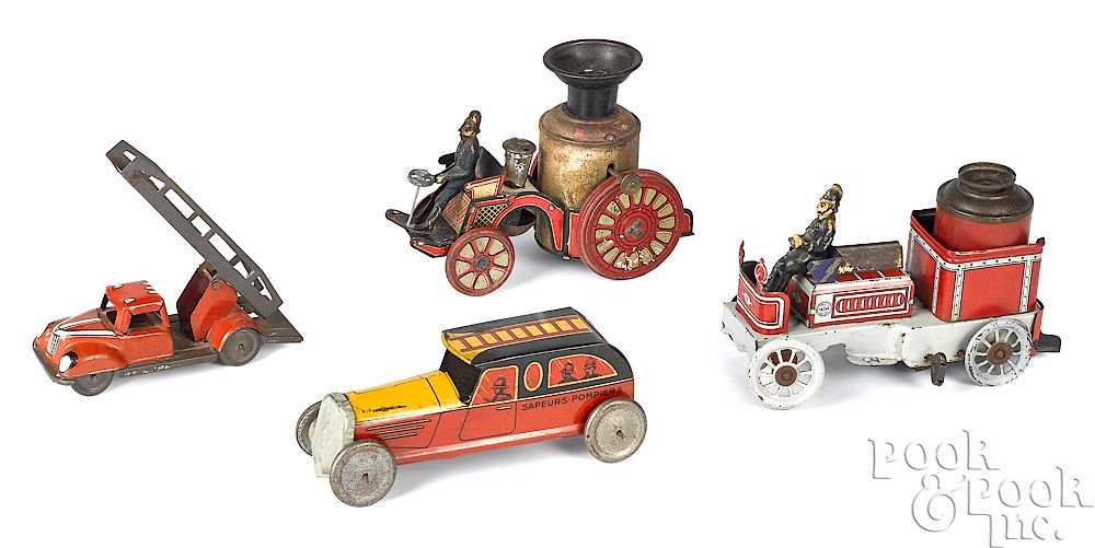 Appraisal: Two tin lithograph fire pumpers etc Two tin lithograph fire