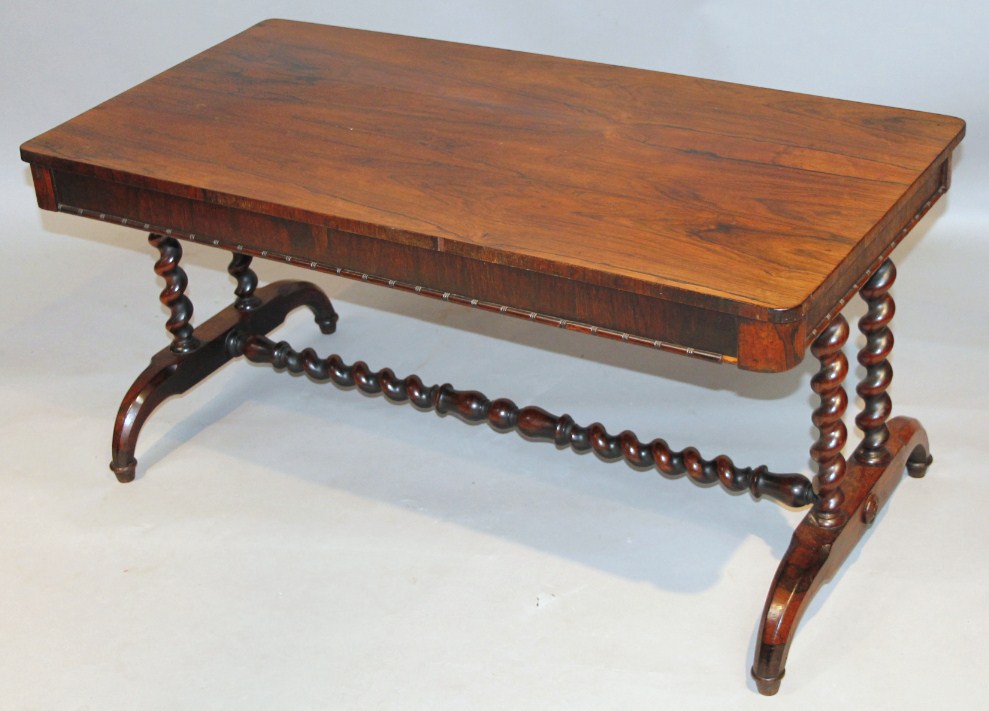 Appraisal: An early thC rosewood library table the oblong top raised