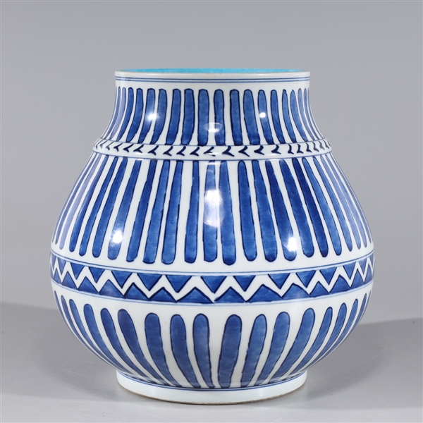 Appraisal: Chinese blue and white porcelain vase with repeating designs to