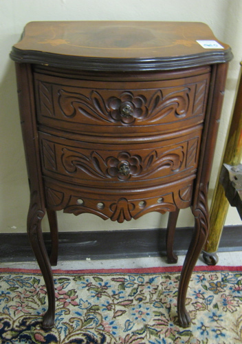 Appraisal: A CARVED AND INLAID WALNUT NIGHTSTAND American c 's The