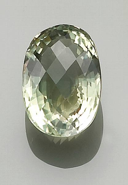 Appraisal: Green Amethyst Brazil A checkerboard faceted oval-cut stone of pleasant