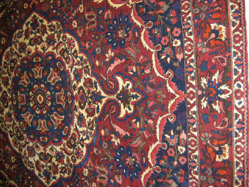 Appraisal: BAKHTIARI ROOM RUG The brown field of floral design centers