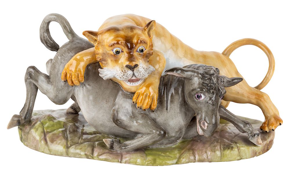 Appraisal: A RUSSIAN PORCELAIN GROUP OF A MOUNTAIN LION ATTACKING A