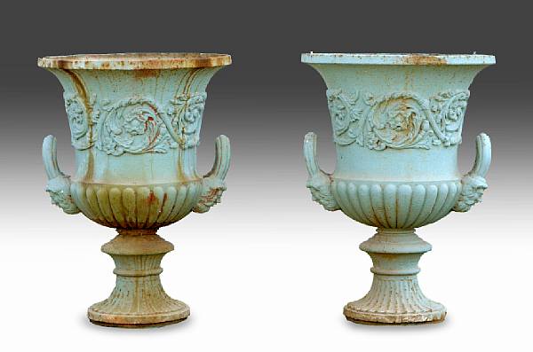 Appraisal: A pair of Neoclassical style blue painted cast iron jardini