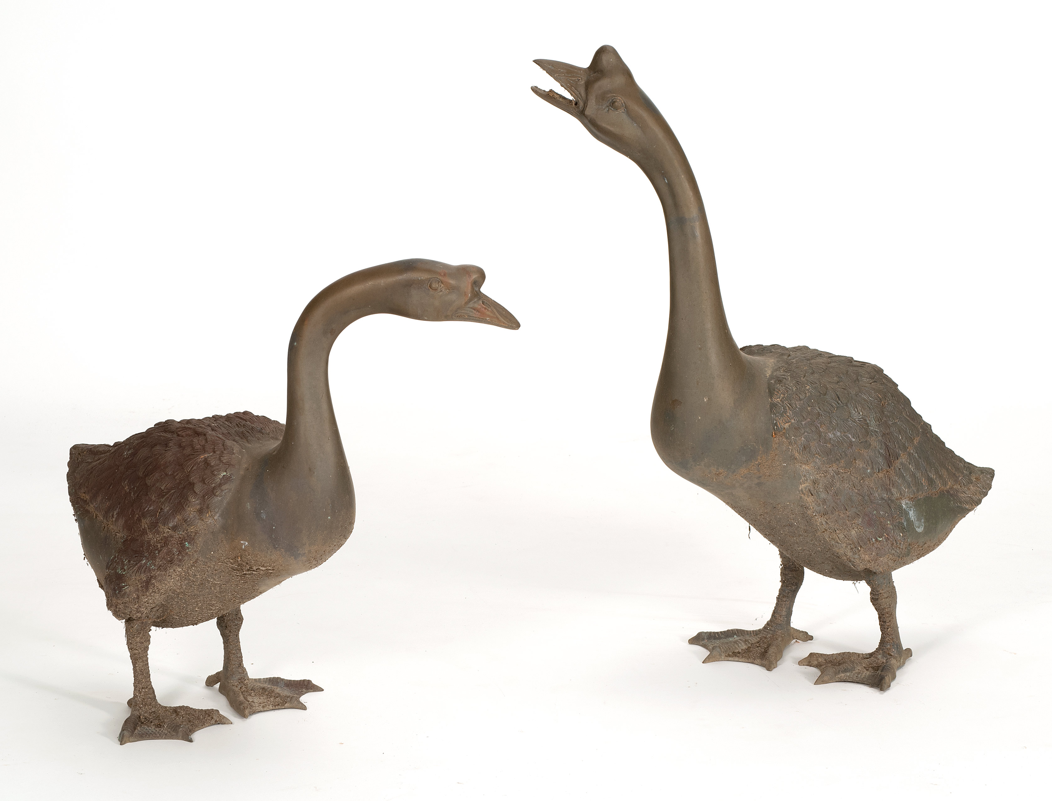 Appraisal: PAIR OF BRONZE GOOSE GARDEN ORNAMENTS th CenturyHeights and ConditionGood