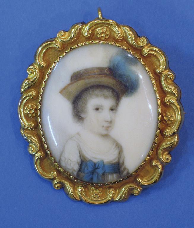 Appraisal: ENGLISH SCHOOL A portrait miniature pendant brooch of a young