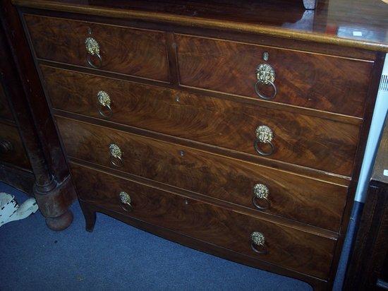 Appraisal: A Regency mahogany chest the top crossbanded in satinwood fitted