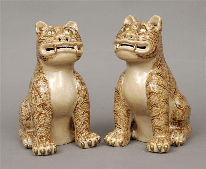 Appraisal: Pair of Chinese Polychrome Porcelain Fu Dog Figures Chop mark