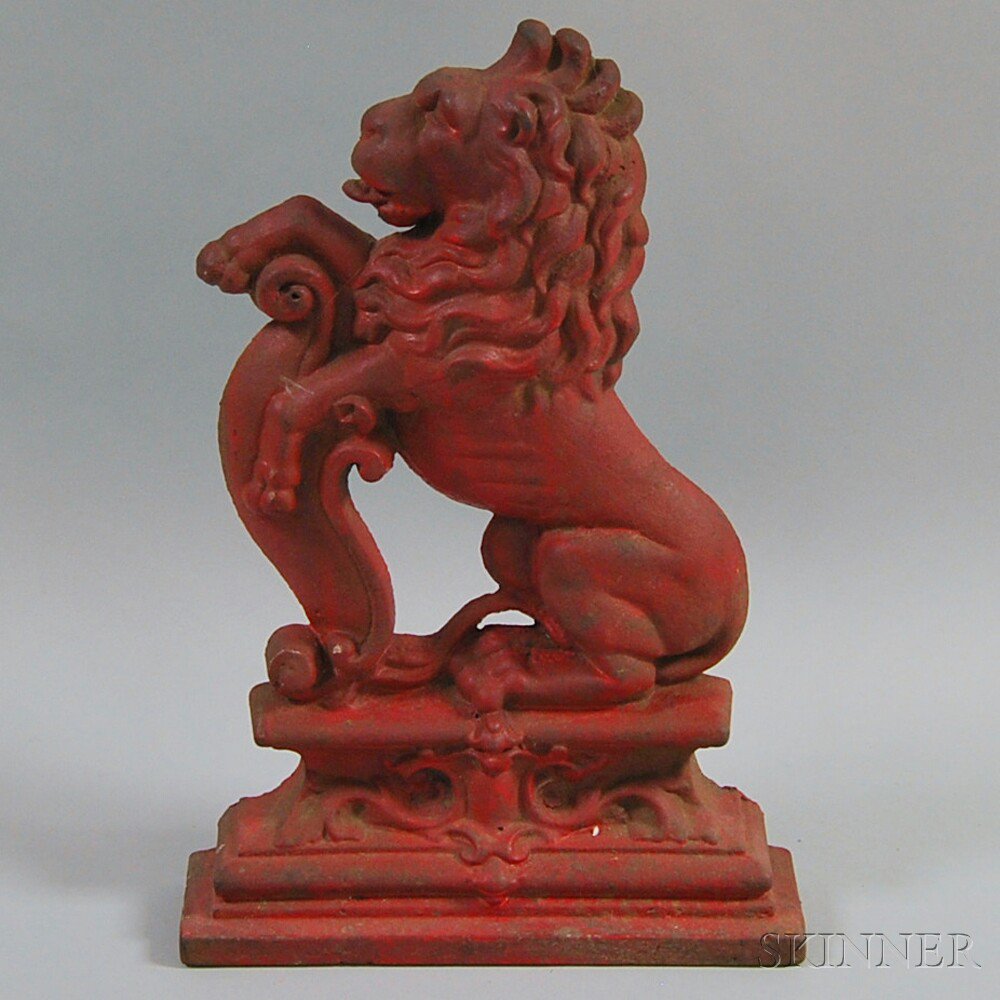 Appraisal: Red-painted Cast Iron Lion Doorstop th century the seated lion