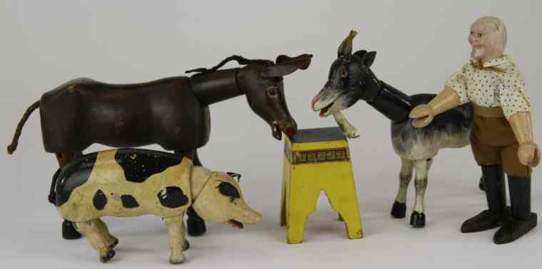 Appraisal: SCHOENHUT FARMER AND ANIMALS Wood jointed hand painted includes farmer