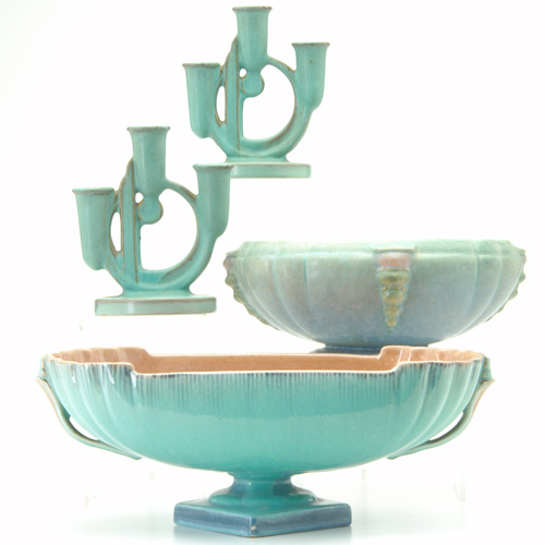 Appraisal: ROSEVILLE Four pieces a pair of green Moderne triple candlesticks