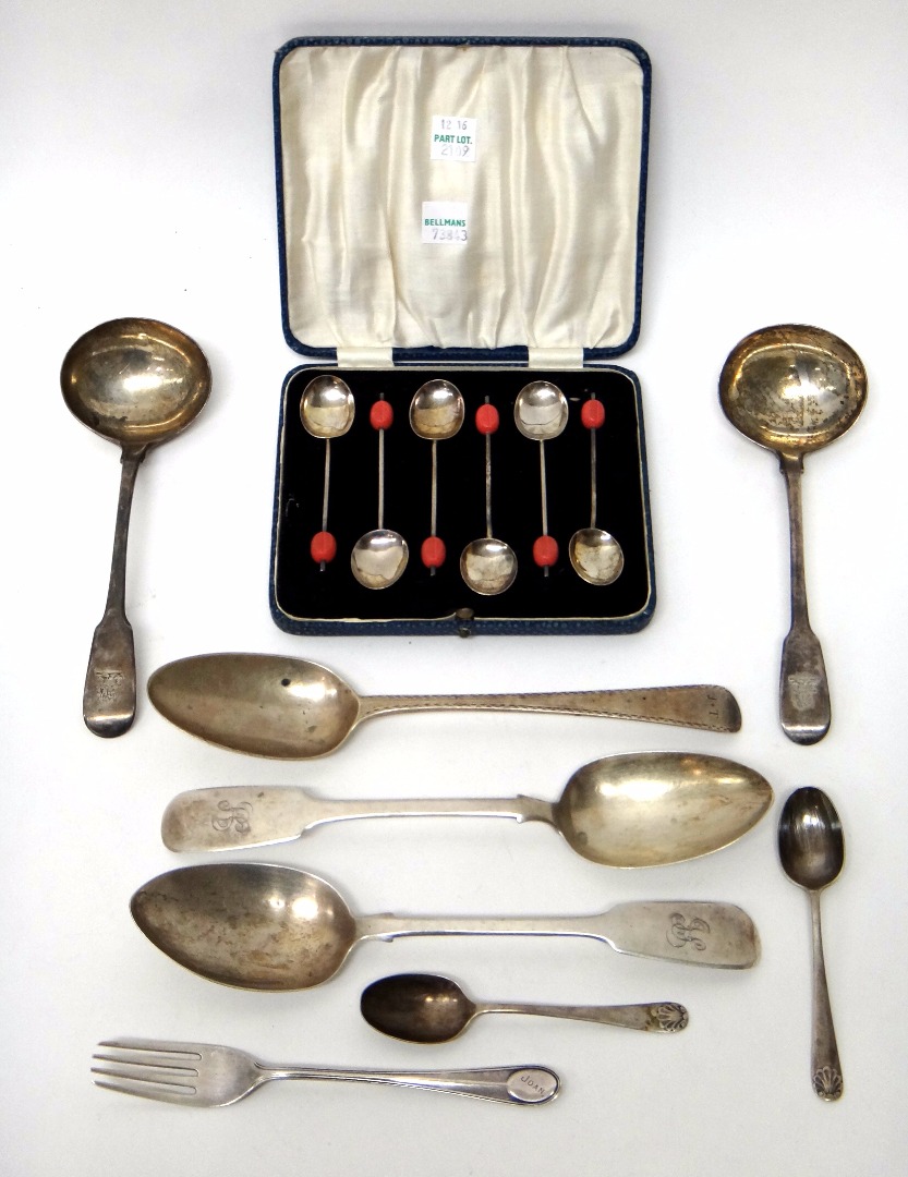 Appraisal: Silver flatware comprising a pair of fiddle pattern sauce ladles