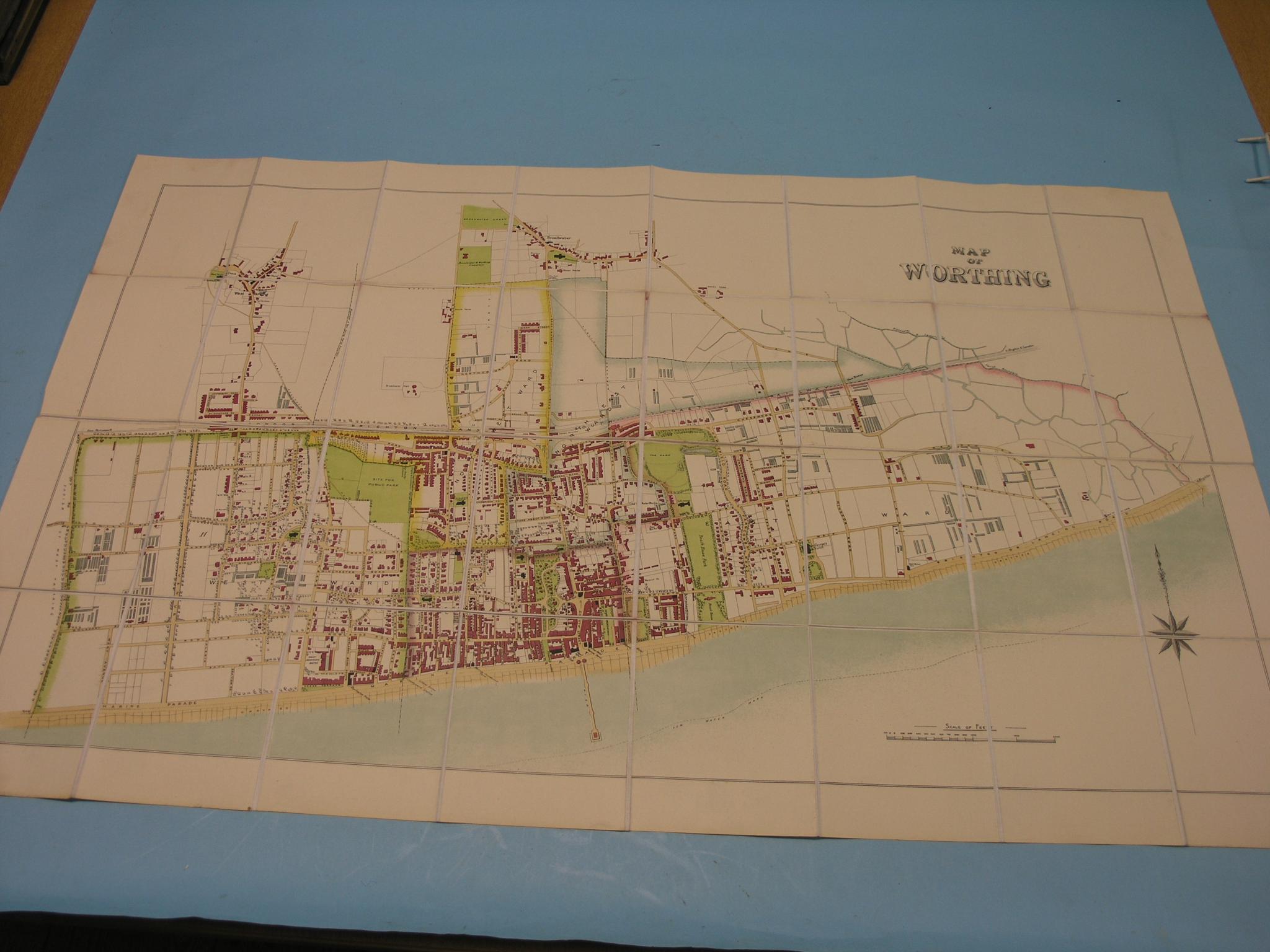 Appraisal: An early Map of Worthing colour-printed with roads parks and