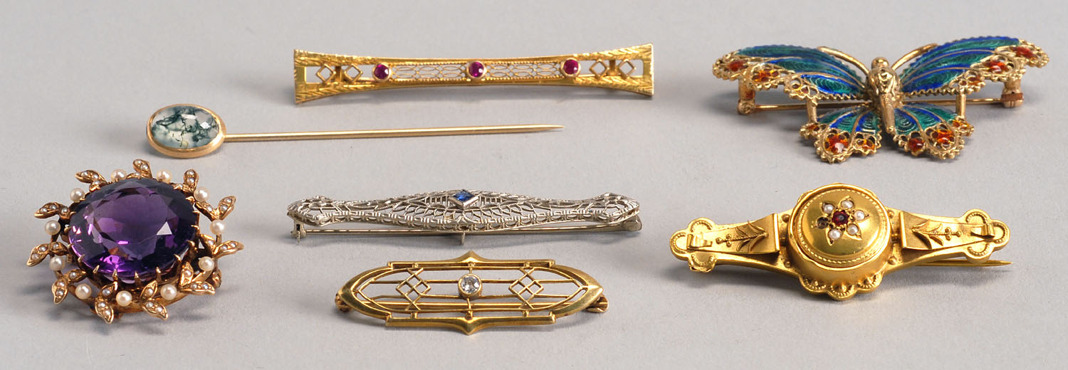 Appraisal: SEVEN GOLD PINS Includes a kt yellow gold butterfly with