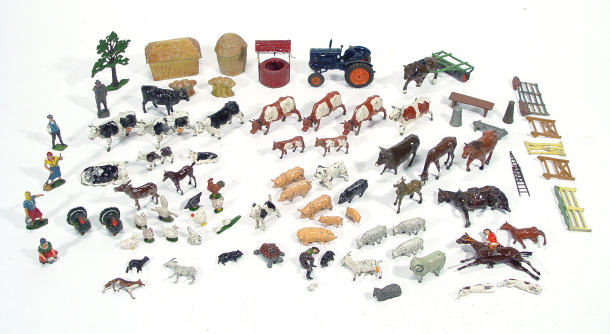 Appraisal: Good collection of Britains painted lead farmyard animals hay bales