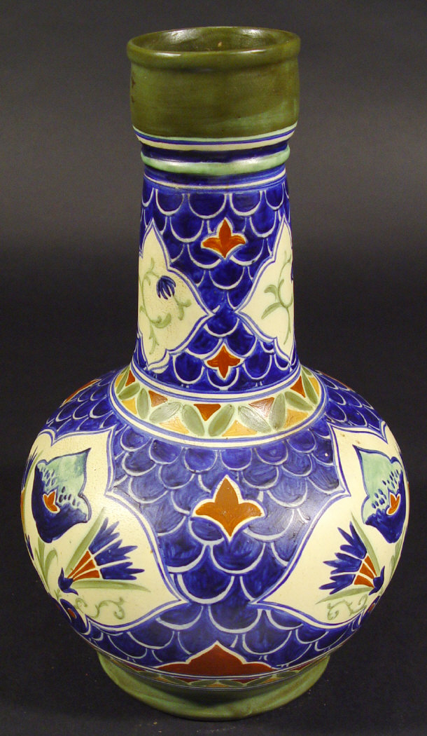 Appraisal: Art Nouveau pottery vase painted with blue flowers onto a