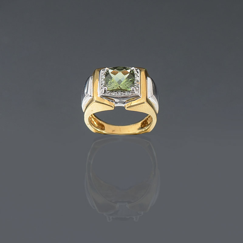 Appraisal: K DEMANTOID GARNET AND DIAMOND RING K yellow gold ring