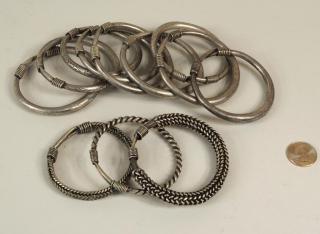 Appraisal: Group Chinese Miao Culture Silver Bangles Group of twelve Chinese