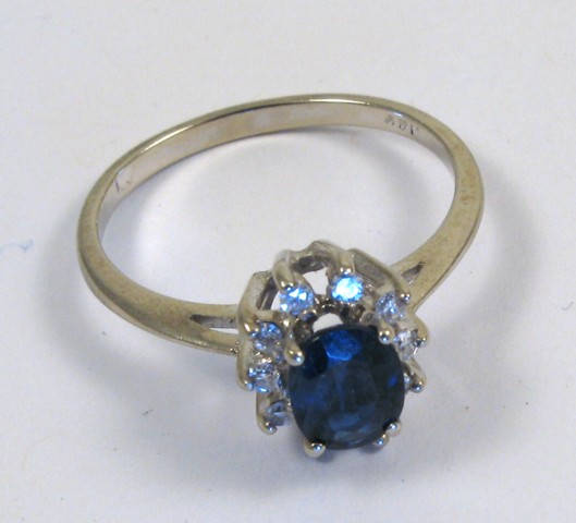 Appraisal: SAPPHIRE DIAMOND AND WHITE GOLD RING The k gold setting