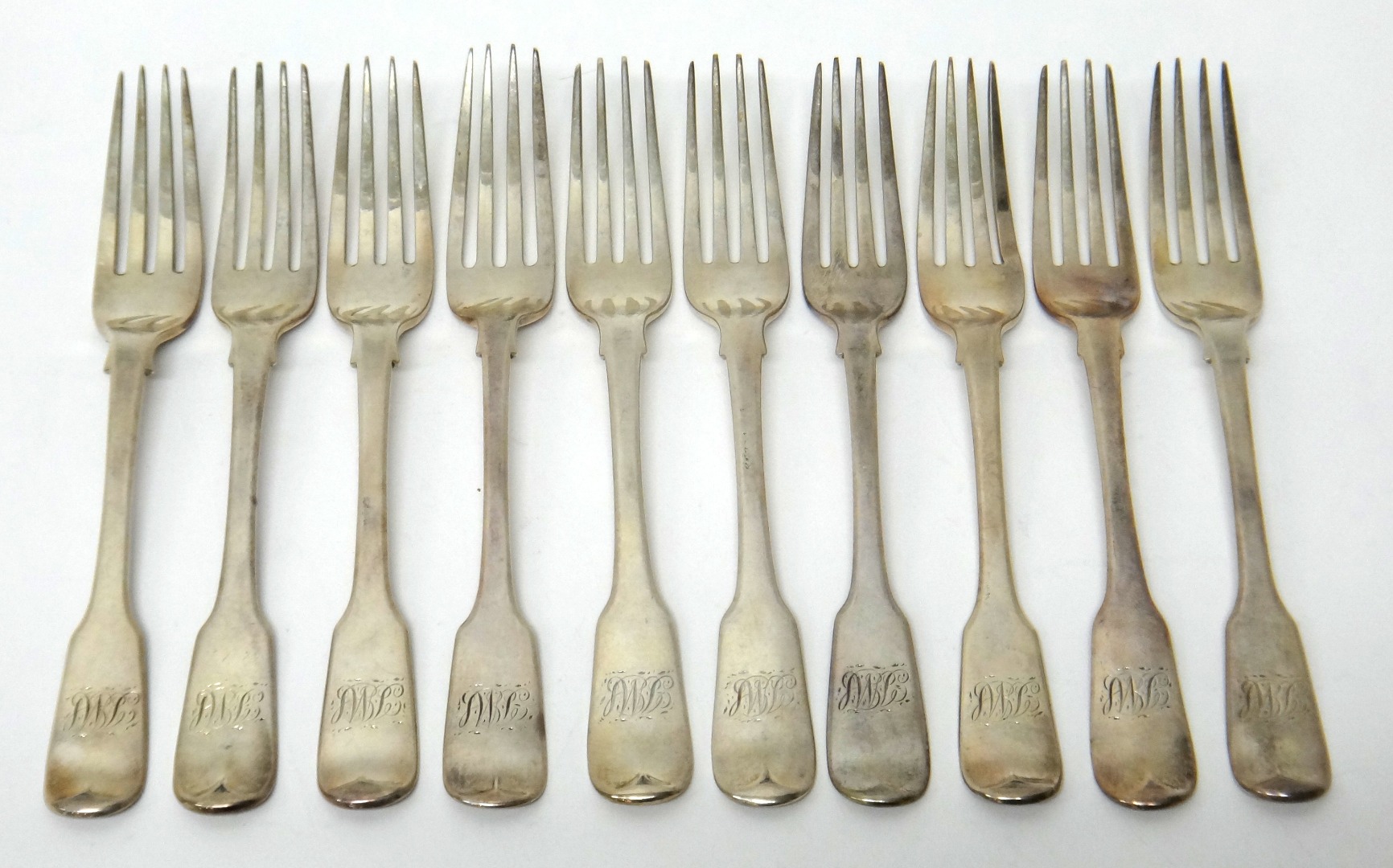 Appraisal: Silver fiddle pattern table forks comprising four Victorian London four