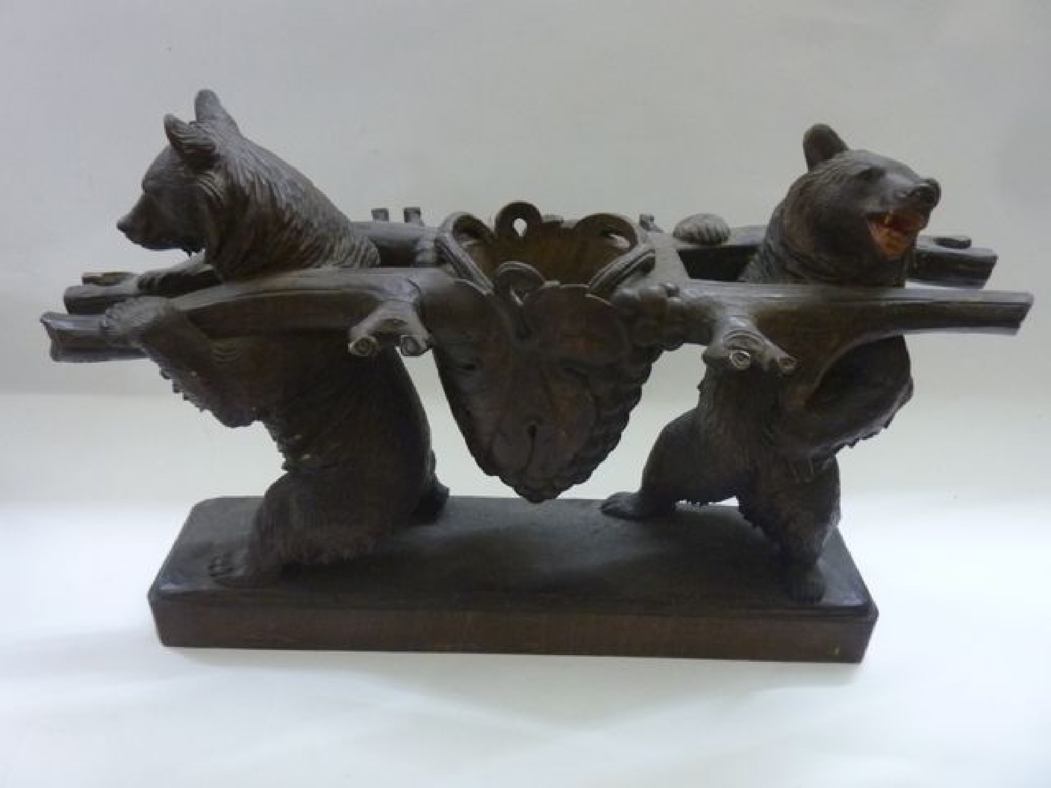 Appraisal: A th century Tyrolean Black Forest liqueur decanter stand in