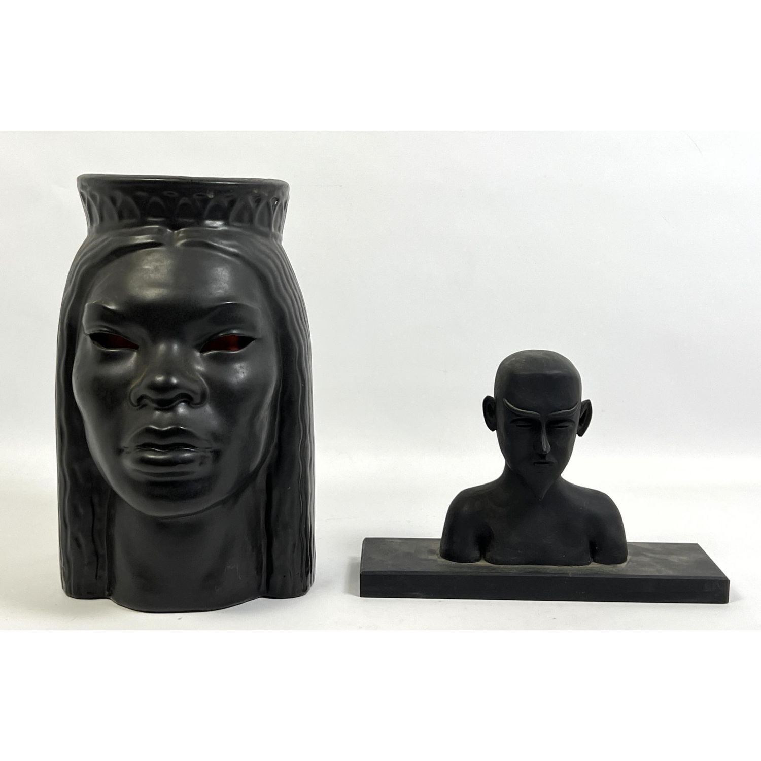 Appraisal: pc Modernist Sculpture Busts Smaller is Carved Wood Tall is