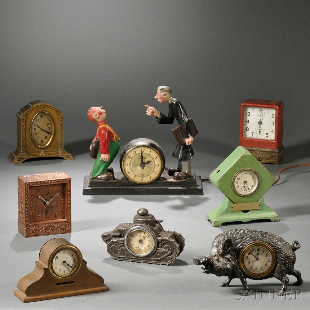 Appraisal: Nine Metal Clocks various makers including two electrics a saddled