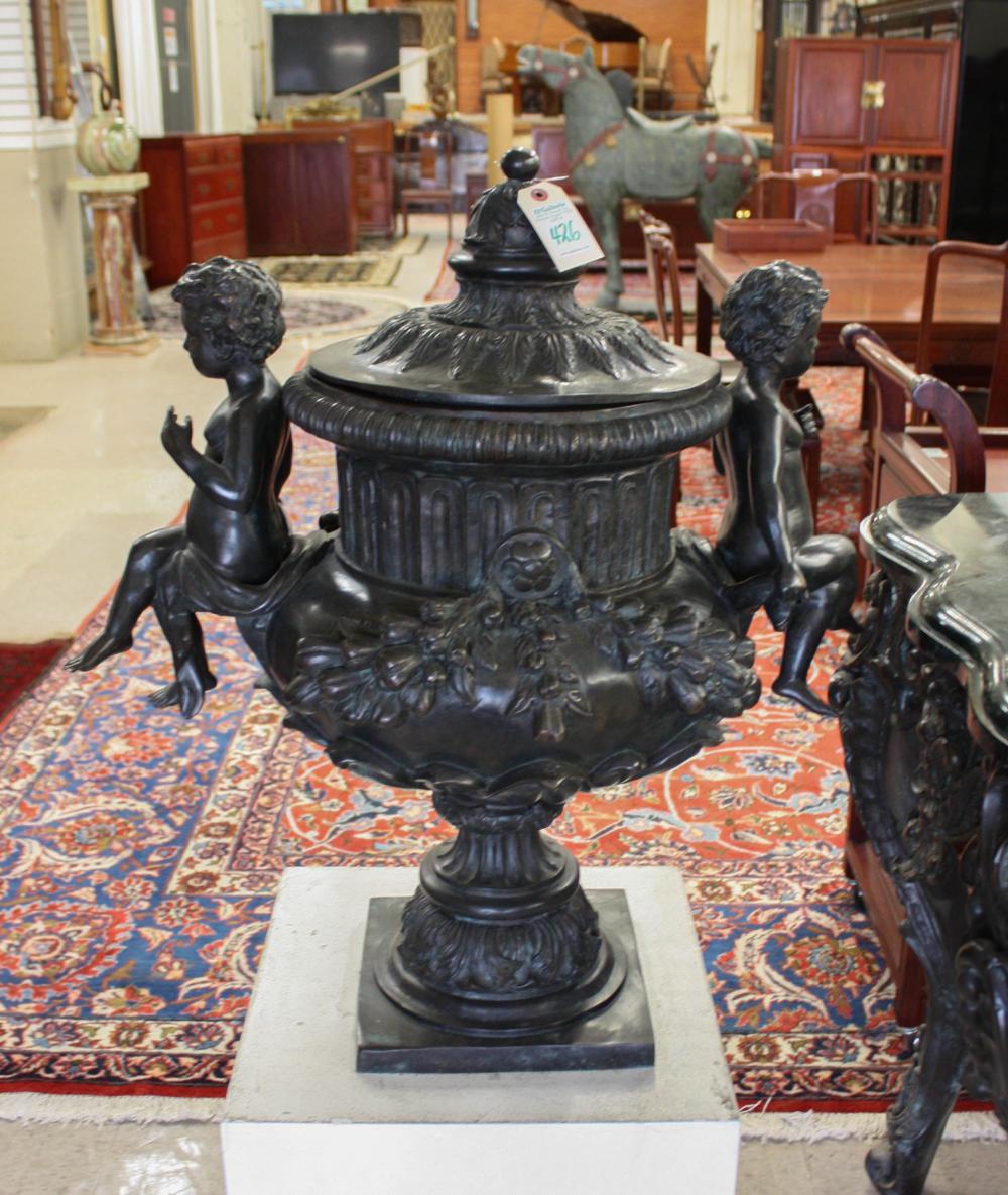 Appraisal: LARGE PATINATED BRONZE URN footed campana form with round lid