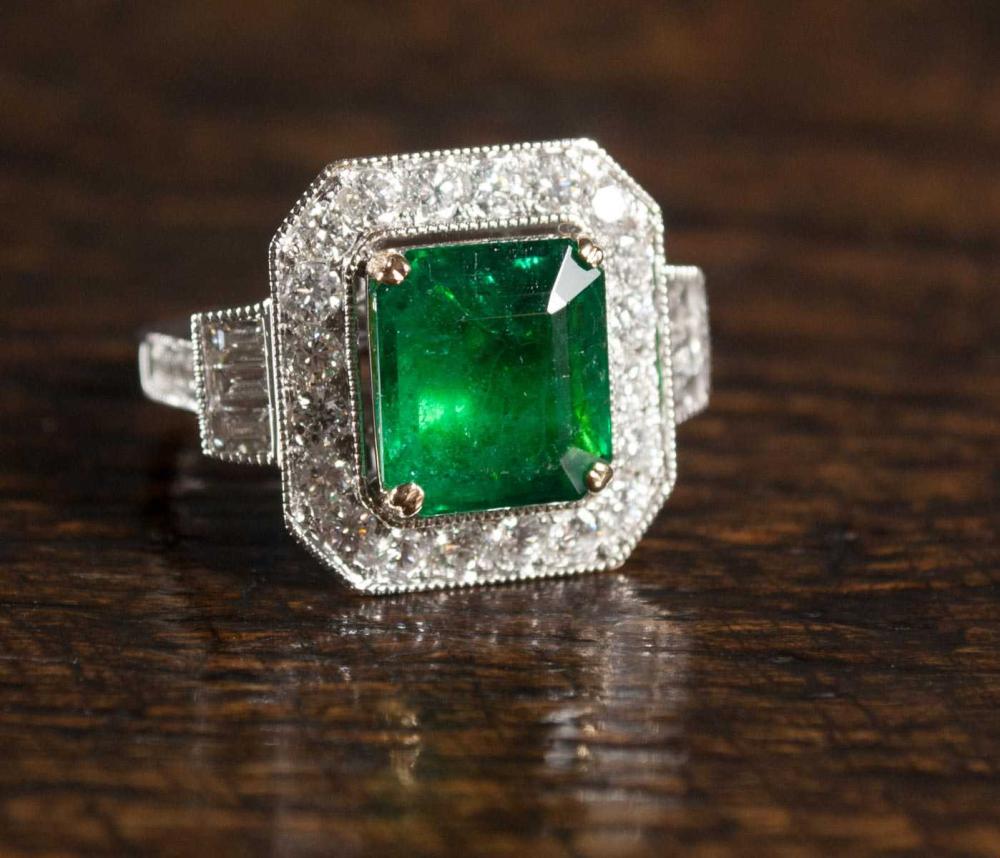 Appraisal: EMERALD DIAMOND AND EIGHTEEN KARAT GOLD RING WITH GIA REPORT