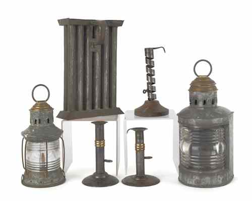 Appraisal: Collection of lighting to include two hogscraper candlesticks two lanterns