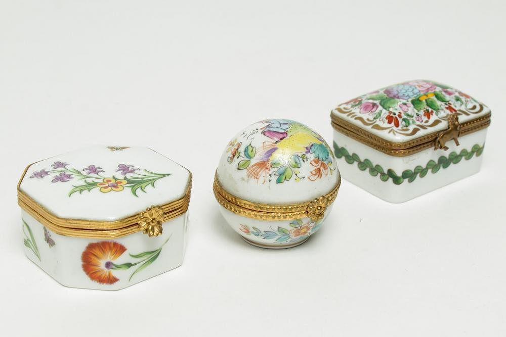 Appraisal: Tiffany Co Limoges Porcelain Pillboxes Limoges for Tiffany three ormolu-mounted