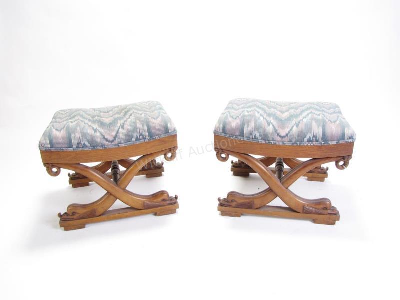 Appraisal: A pair of Biedermeier style stools wood frames with dolphin