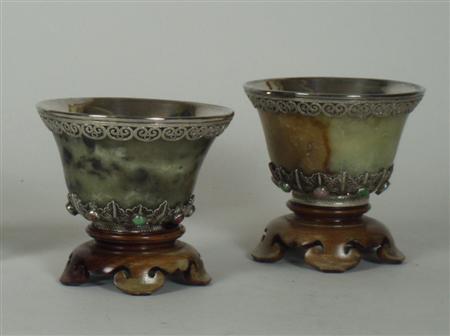 Appraisal: A pair of white metal and onyx bowls in the