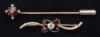 Appraisal: DIAMOND GARNET PINS kt yellow gold brooch has center mm