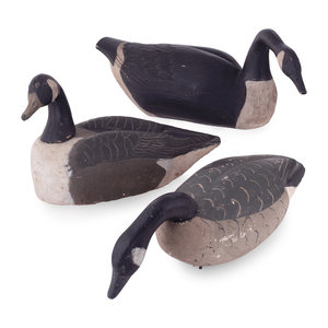 Appraisal: Three Painted Goose Decoys th Century one in wood one