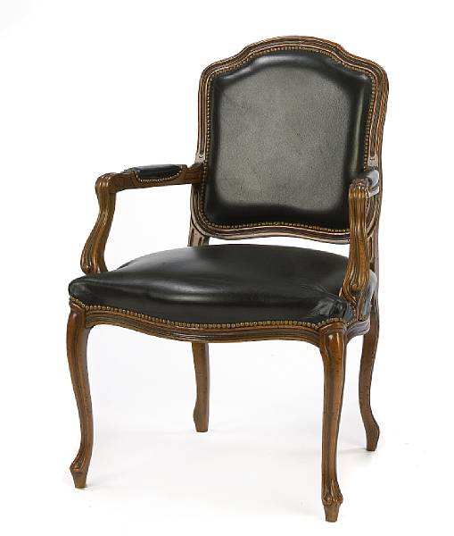 Appraisal: A pair of Louis XV style walnut fauteuils height in