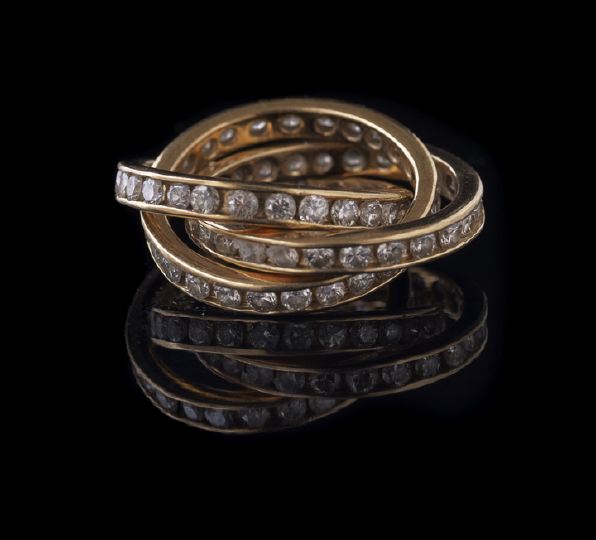 Appraisal: Lady's Fourteen-Karat Yellow Gold and Diamond Rolling Ring composed of