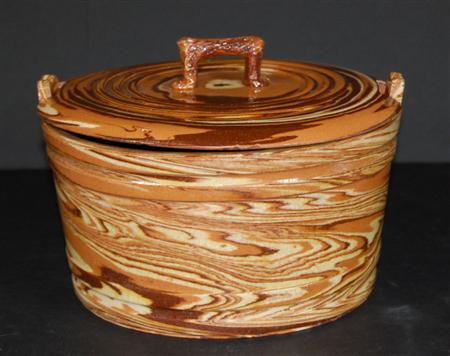 Appraisal: A late th century Agateware bowl and cover the brown