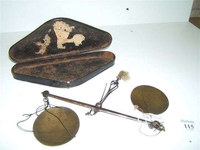 Appraisal: A SET OF GEORGIAN IRON AND BRASS COIN SCALES in