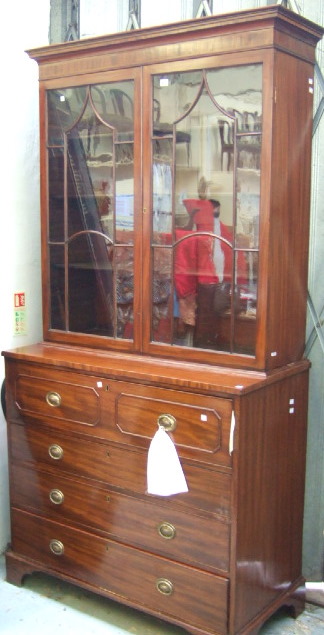 Appraisal: A George III mahogany secretaire bookcase the plain stepped cornice