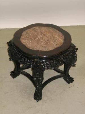 Appraisal: A PADOUK WOOD JARDINIERE STAND of circular form the moulded