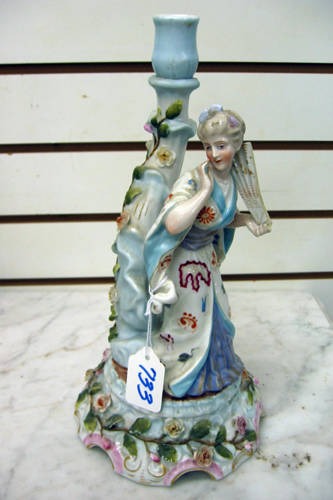 Appraisal: GERMAN PORCELAIN FIGURAL CANDLE STICK hand painted under glaze Depicts