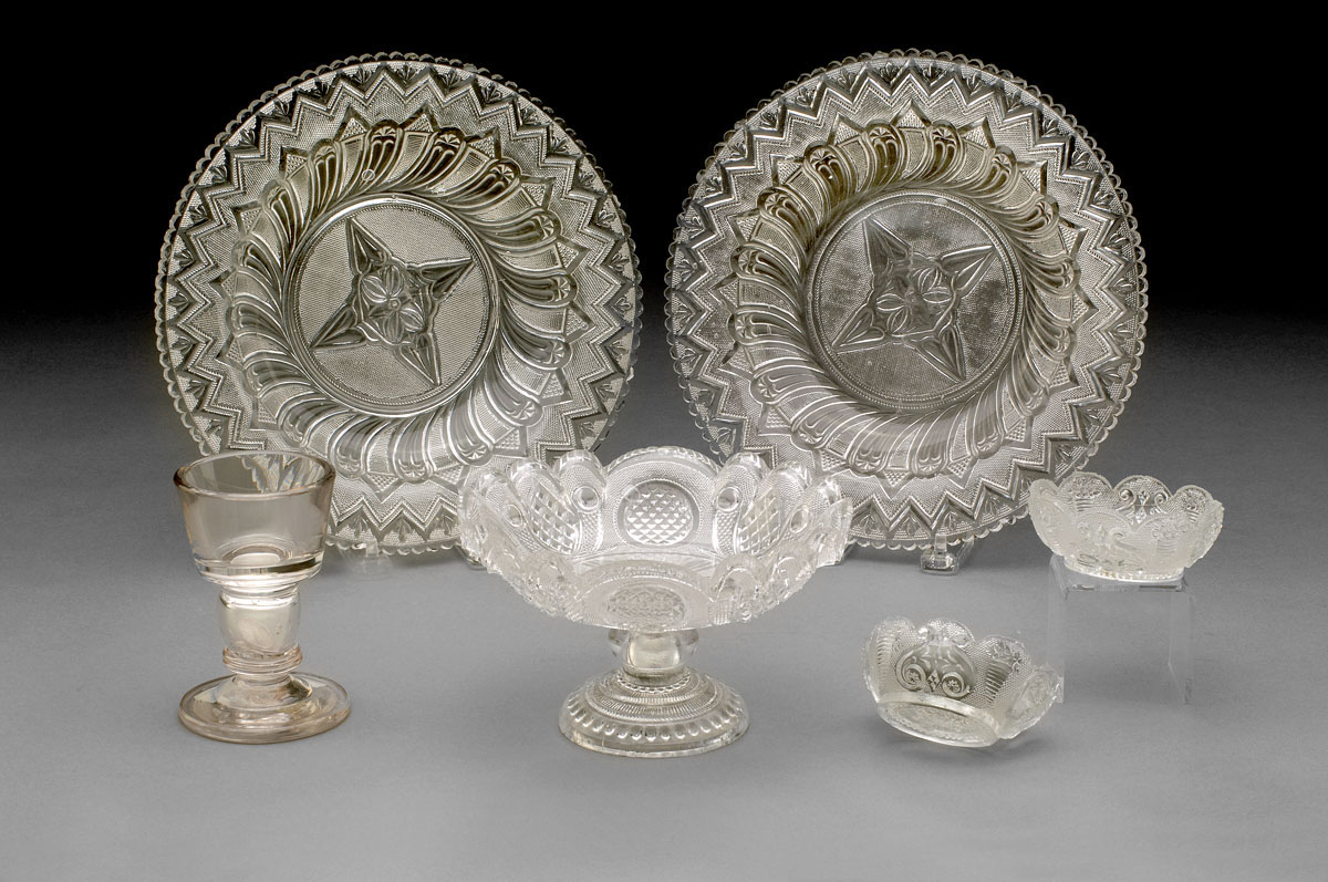 Appraisal: PAIR OF LACY PRESSED COLORLESS 'FEATHER' PATTERN DISHES BOSTON SANDWICH