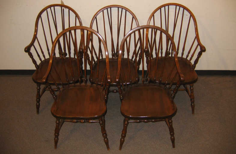 Appraisal: SET OF FIVE WINDSOR STYLE ARMCHAIRS The hoop backs continue