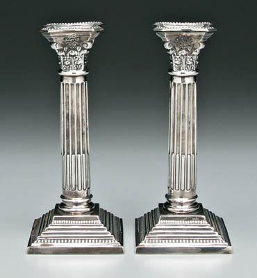 Appraisal: Pair English silver candlesticks each with Ionic column round stop