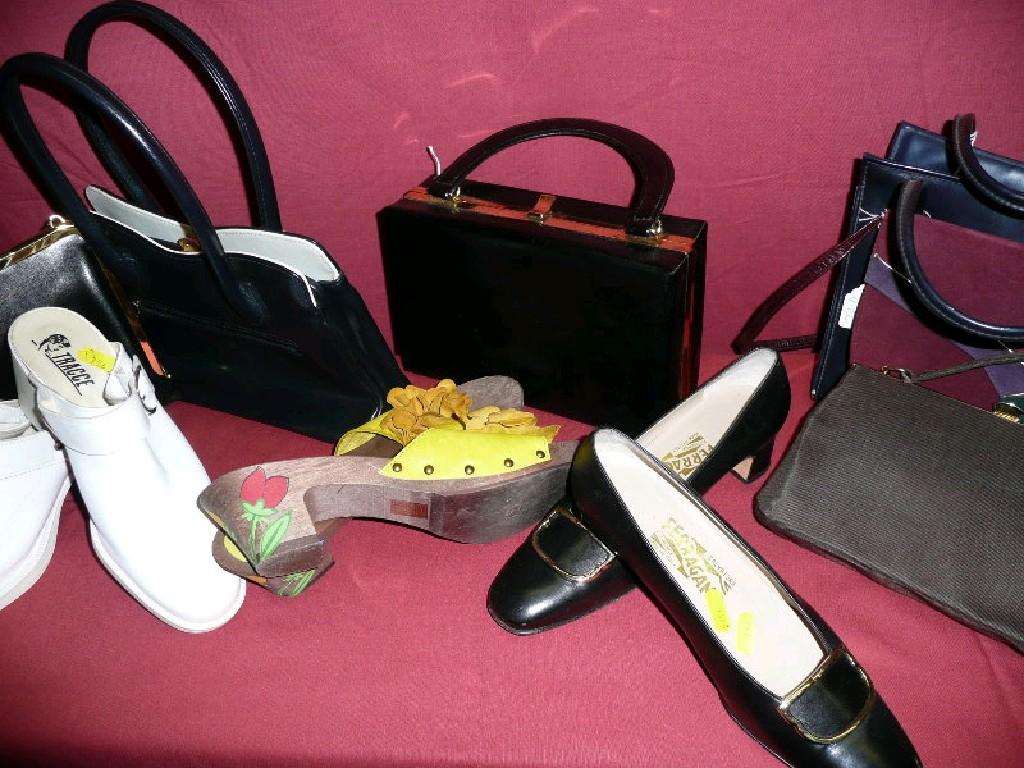 Appraisal: A group of handbags and shoes to include Guy La