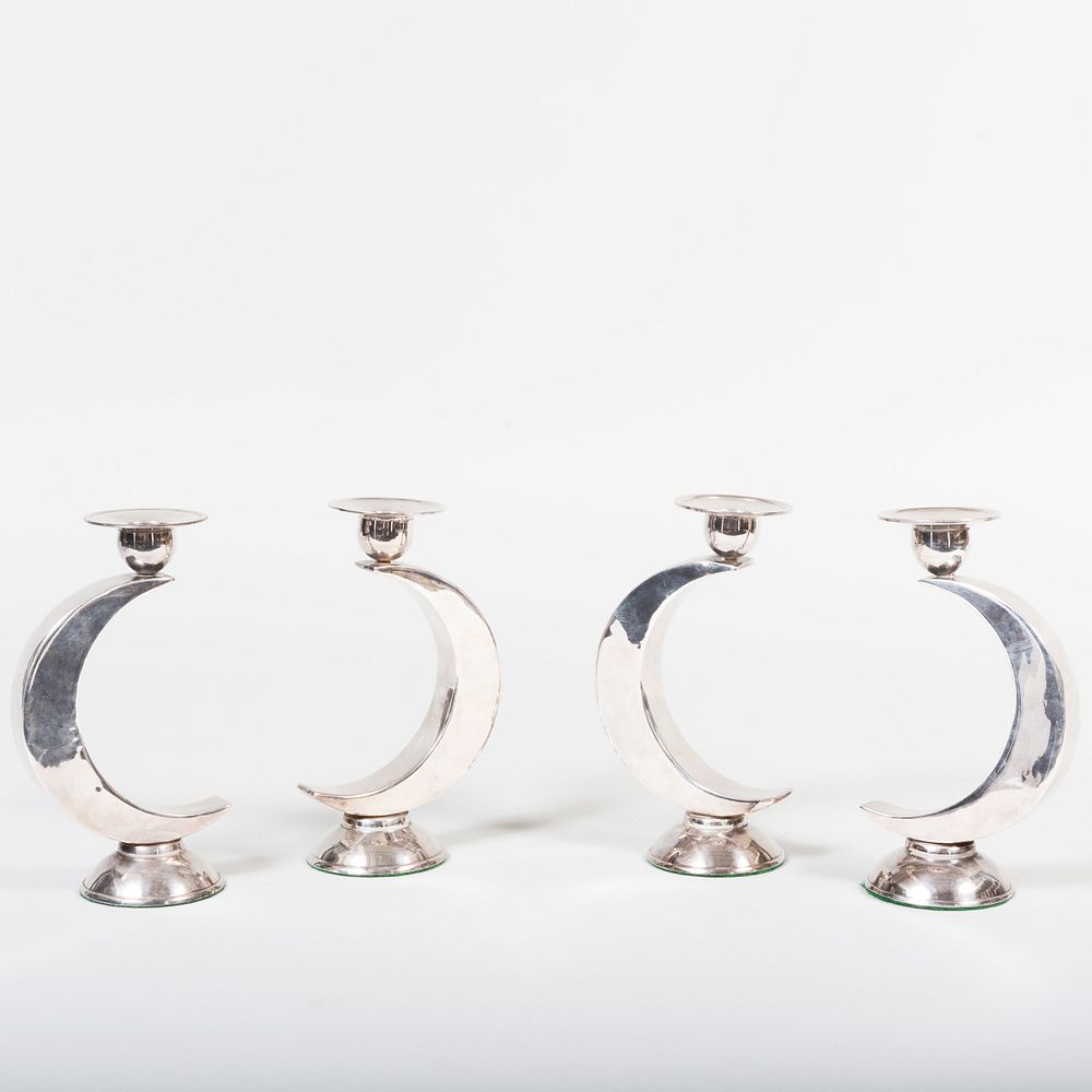 Appraisal: Set of Four Continental Silver Plate Candlesticks in high Condition