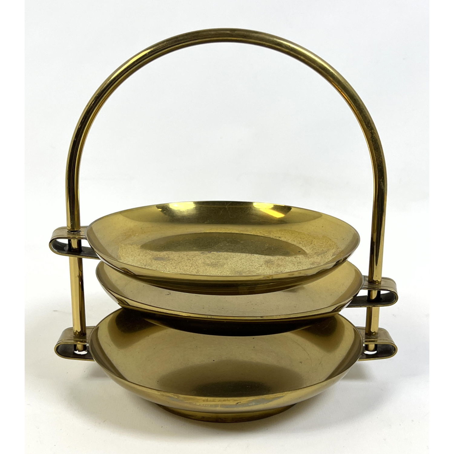 Appraisal: TOMMI PARZINGER Brass Three Part Serving Dish Arched form has